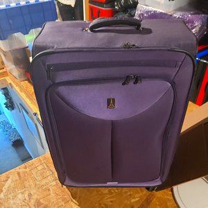 Luggage Large Travelpro  Purple Never used